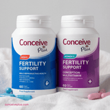 Two Conceive Plus fertility support supplement bottles, one for men and one for women, on a white background.